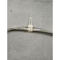 Adjustable cable clip with adhesive socket